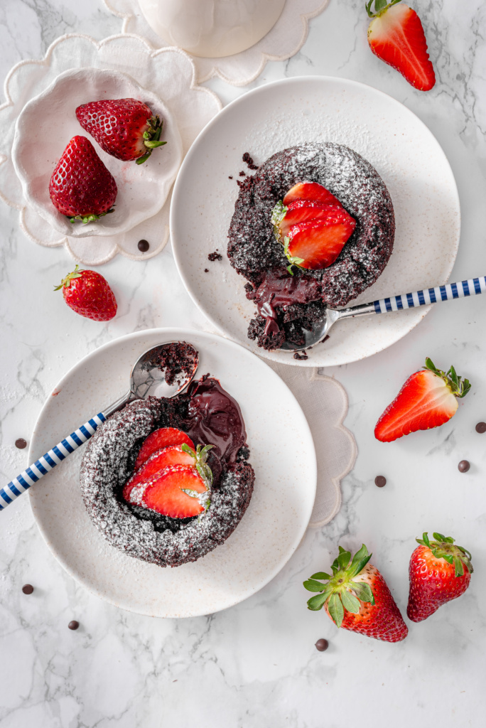 An overhead shot of Red Velvet Lava Cake with strawberries